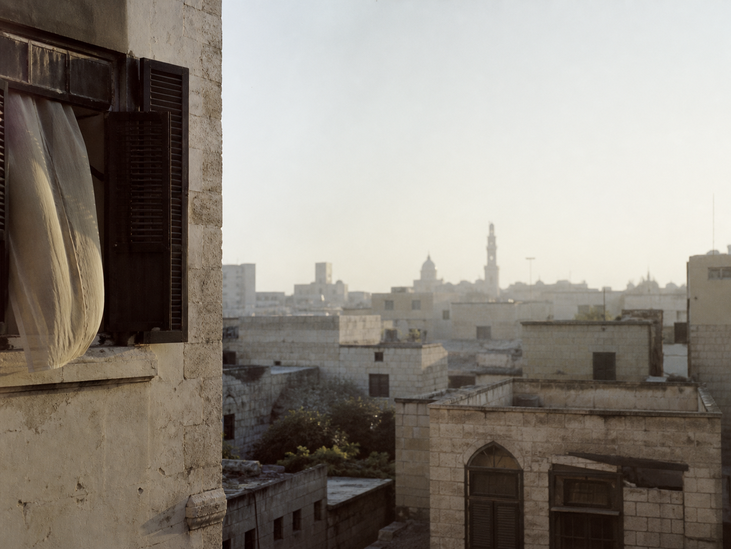 A quiet Damascus rooftop at first light.
